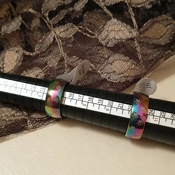 🎈3/$12 Iridescent Paw Print Band Ring! - Picture 2 of 4